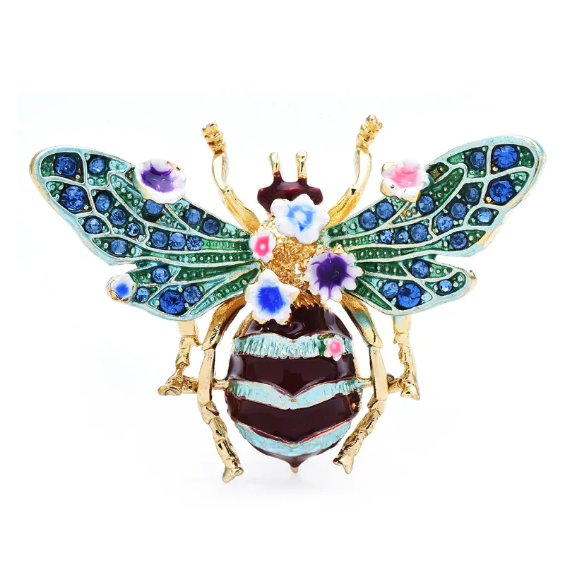 Broche abeille à fleurs avec ailes bleues et vertes détaillées, corps rayé noir et blanc, décor floral coloré en émail et métal doré