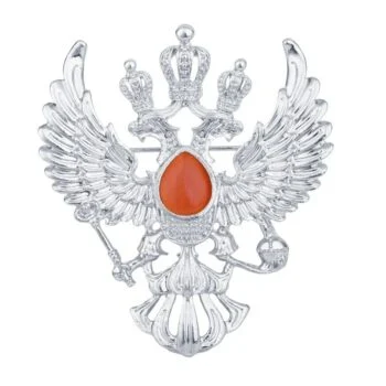 Broche aigle d'empire en métal argenté avec pierre centrale orange en forme de goutte