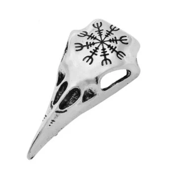 Broche en métal argenté en forme de crâne de corbeau viking avec motif gravé symbole nordique sur le dessus