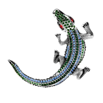 Broche crocodile strass avec strass verts, bleus et noirs, yeux rouges, détail soigné et finition élégante