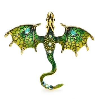 Broche dragon verte en métal doré avec ailes émaillées vertes et jaunes ornées de motifs en forme de toile d'araignée et strass bleus