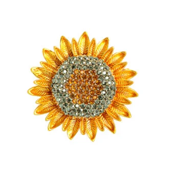 Broche fleur de tournesol dorée avec strass orange et gris au centre, motif pétales détaillé