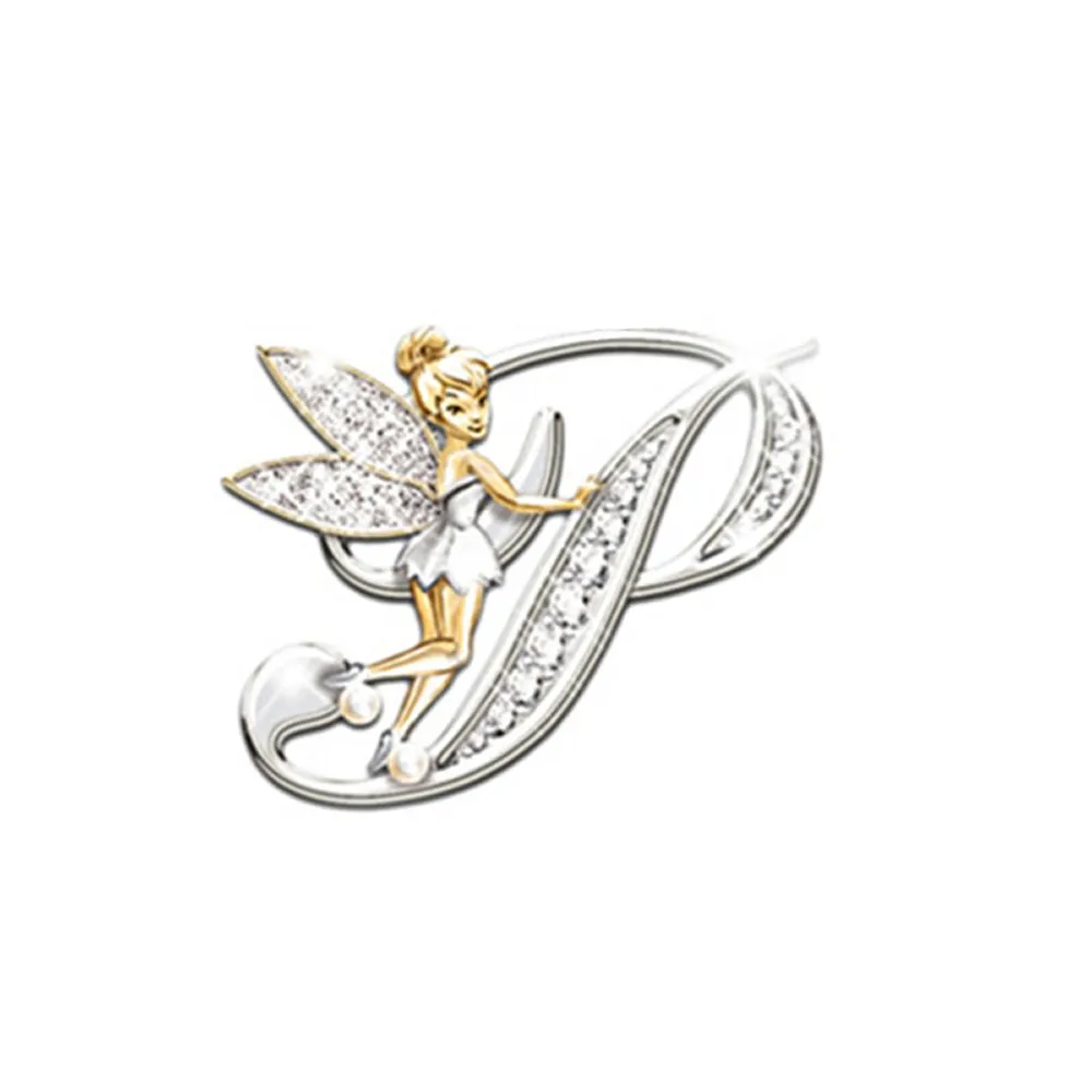 Broche Grandes Lettres en métal argenté représentant la lettre P avec une fée dorée aux ailes incrustées de strass