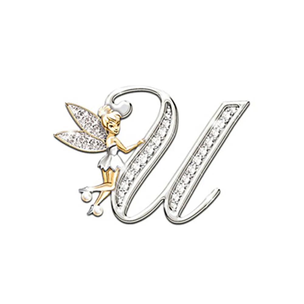 Broche grandes lettres en forme de lettre U avec fée dorée et ailes incrustées de strass