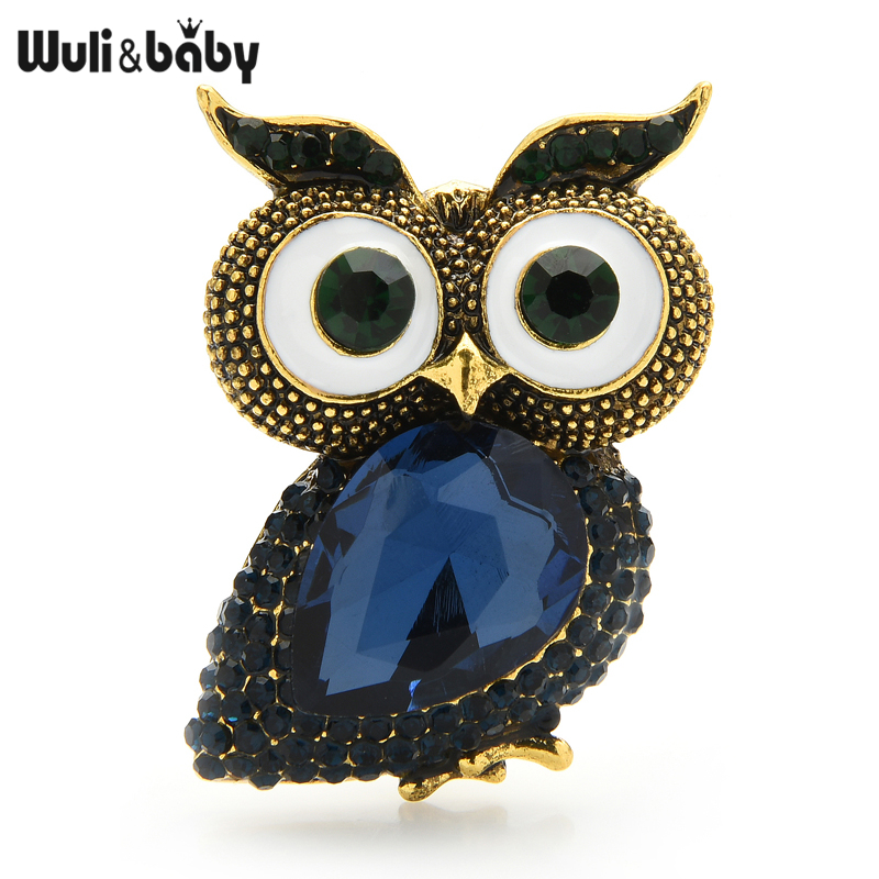 Broche hibou gros yeux avec corps en pierre bleue facettée et détails dorés, motif original et finition soignée