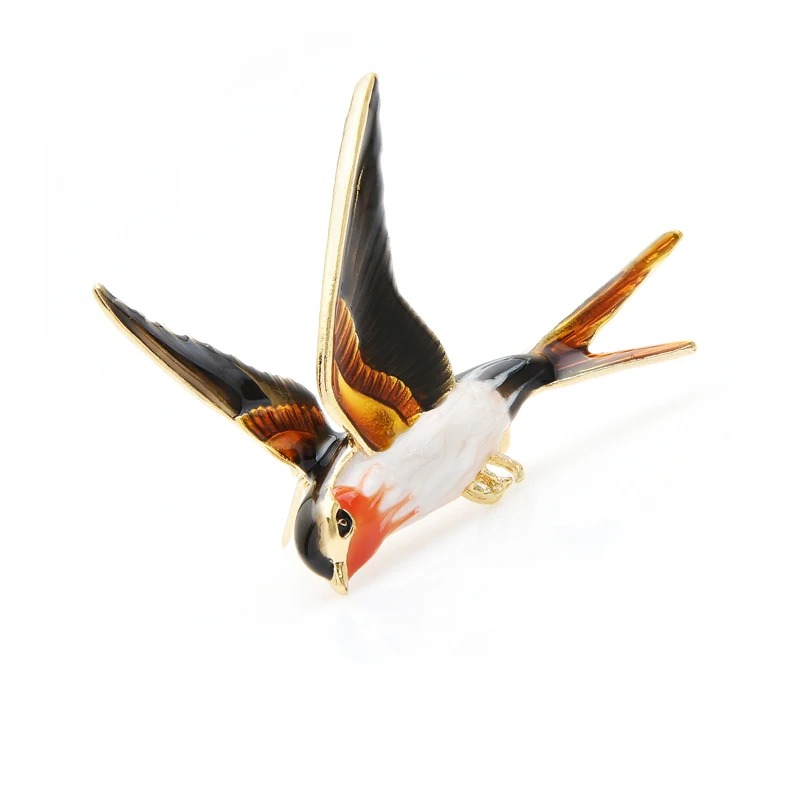 Broche hirondelle colorée en métal émaillé vue de côté avec ailes déployées