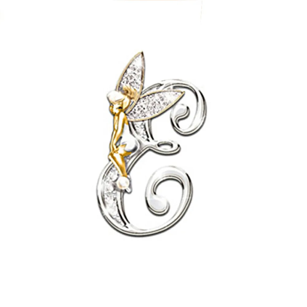 Broche grandes lettres lettre C en métal argenté avec fée dorée et ailes incrustées de strass