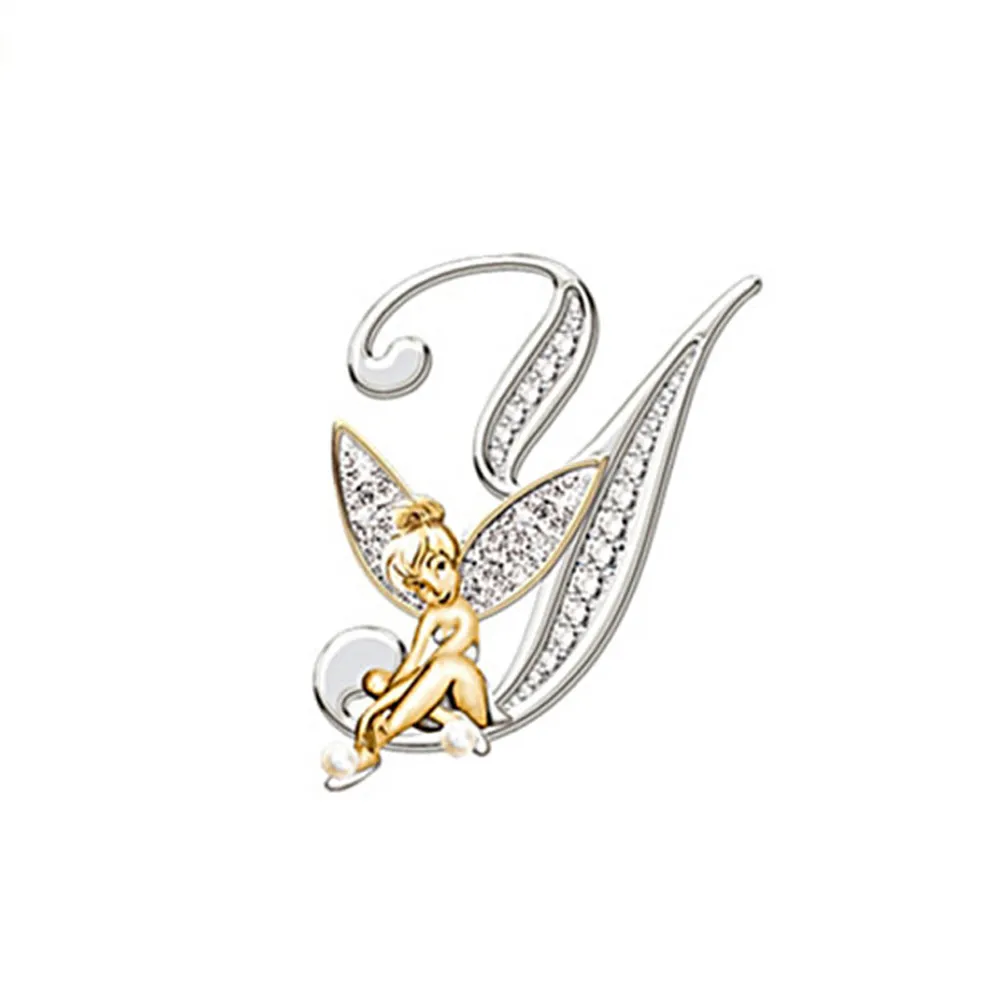 Broche grandes lettres en forme de lettre V argentée avec fée dorée aux ailes incrustées de strass
