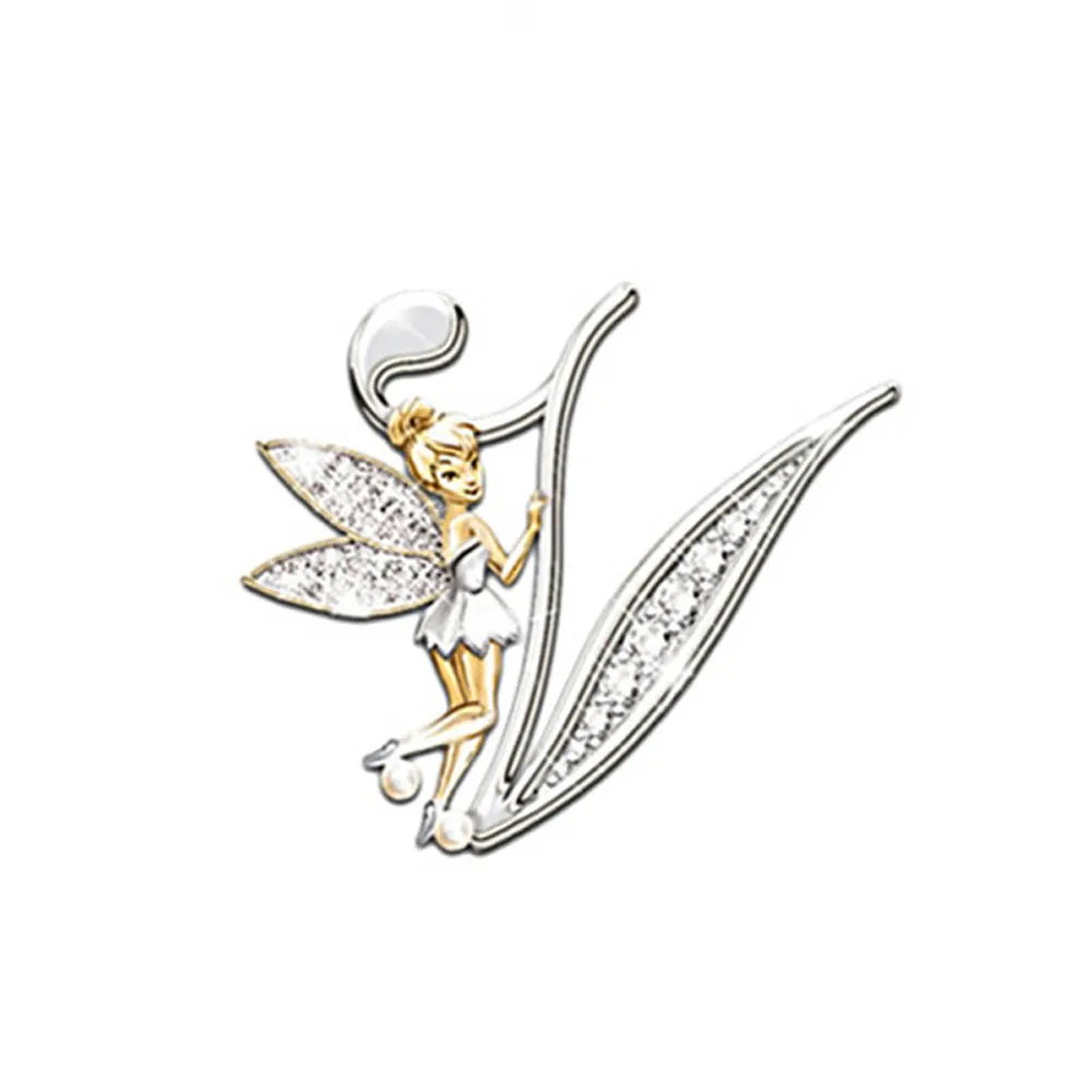 Broche grandes lettres en forme de lettre V avec une fée dorée et ailes argentées ornées de strass