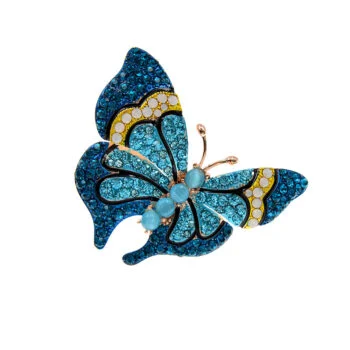Broche papillon bleu en métal avec strass bleus et jaunes, détail soigné des ailes et corps orné de pierres bleues