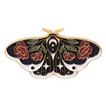 Broche papillon bohème en métal doré avec émail noir et motifs floraux rouges et verts