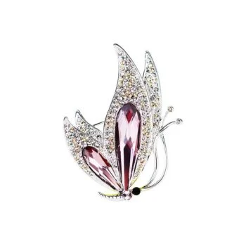 Broche papillon en métal argenté avec strass clairs et pierres roses taillées