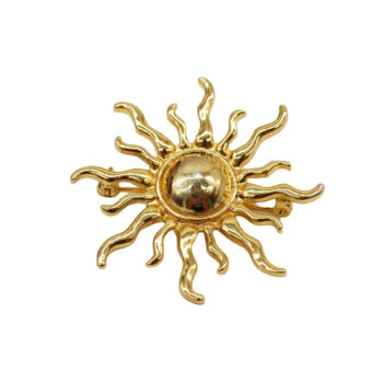 Broche Soleil dorée en métal avec rayons ondulés et centre bombé