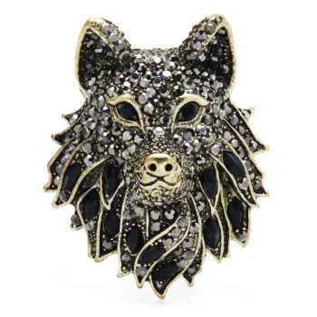 Broche tête de loup en strass noirs et dorés avec détails soignés et finition élégante