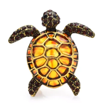 Broche tortue fantaisie en métal avec émail orange et marron, détail soigné de la carapace et des pattes