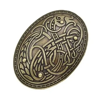 Fibule ovale en métal bronze avec motif de nœuds celtiques entrelacés détaillés