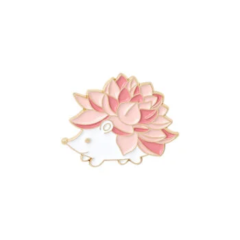 Pin's hérisson femme en métal doré avec émail rose et blanc, motif fleurs stylisées sur le dos