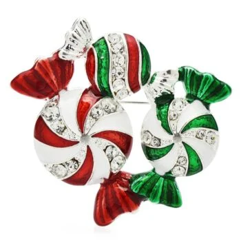 Broche bonbons de Noël en métal argenté émaillé rouge, vert et blanc avec strass, design travaillé en forme de trois bonbons festifs