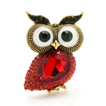 Broche hibou gros yeux en métal doré avec corps en pierre rouge facettée et yeux blancs et noirs