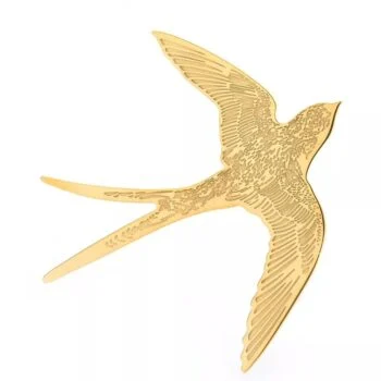 Broche hirondelle en métal doré avec motif gravé détaillé