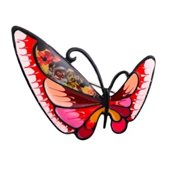 Broche papillon en émail aux ailes rouges, roses et noires avec motif floral détaillé