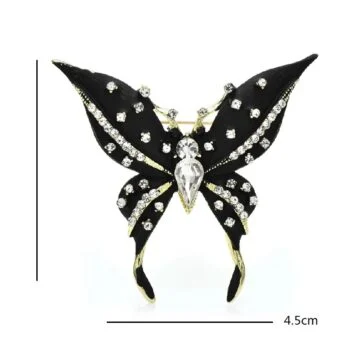 Broche papillon noir en métal avec strass blancs scintillants et détail central en cristal, dimensions 4,2 cm sur 4,5 cm