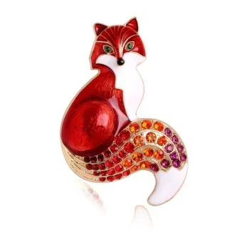 Broche renard rouge et blanche en métal avec strass orange et violet sur la queue, finition soignée